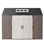 COBERTIZO DE ALMACENAMIENTO PARA EXTERIOR HORIZONTAL RESINA 7 X 10 MARRON/GRIS CON VENTANAS