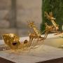 ADORNO NAVIDEÑO TRINEO CON RENOS METÁLICO DORADO 90 CM