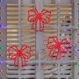 FIGURA NAVIDEÑA MOÑOS CON LUZ LED ROJOS 3.8 M 3 PIEZAS
