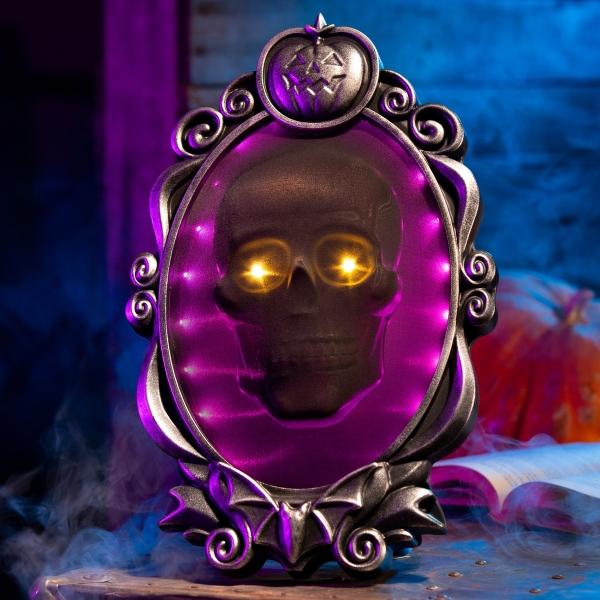 DECORACIÓN ANIMADA LED CALAVERA SALIENTE DE PORTARETRATOS 38 CM